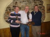 Pat Timmons collecting the trophy for the 2013 Schooner Matchplay competition